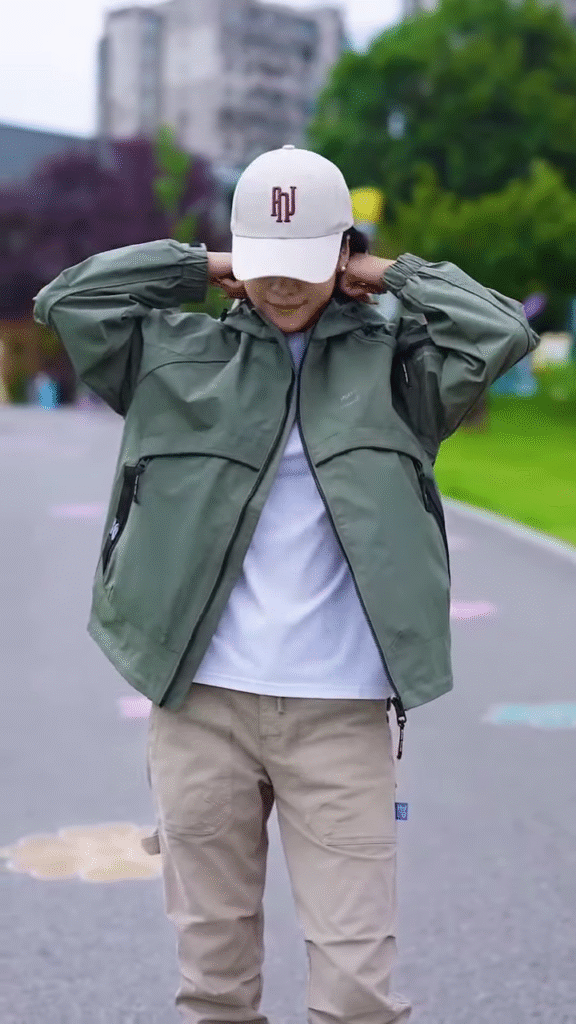 Green Zip-Up Casual Jacket 🧥🌳 – Styled with White Tee & Beige Cargo Pants in Outdoor Setting - Photo 4