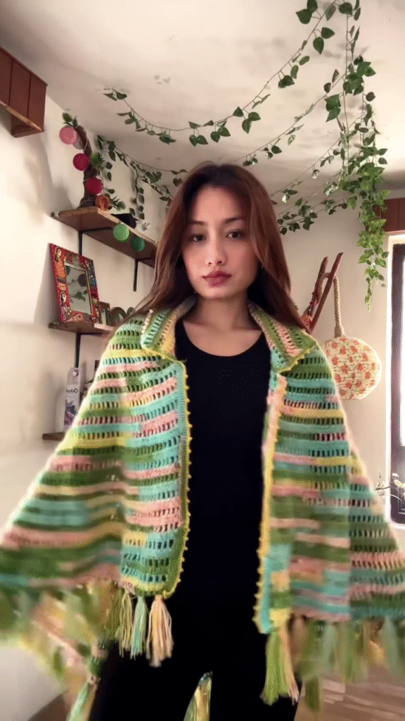 Multicolor Crocheted Shawl with Fringe Detailing 🧶🌈 – Boho Knit Layer Styled Over Black Top - Photo 2