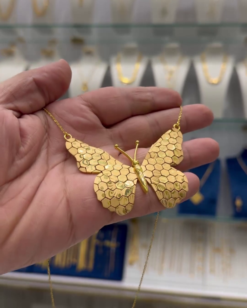 Elegant Butterfly Pendant Necklace – Intricately Designed Gold-Tone Jewelry for Women - Photo 2