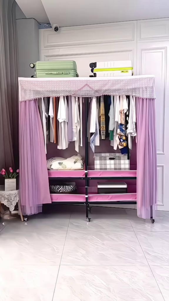 "Portable Fabric Wardrobe Organizer - Lightweight Rolling Clothes Storage with Lavender Curtains" - Photo 1