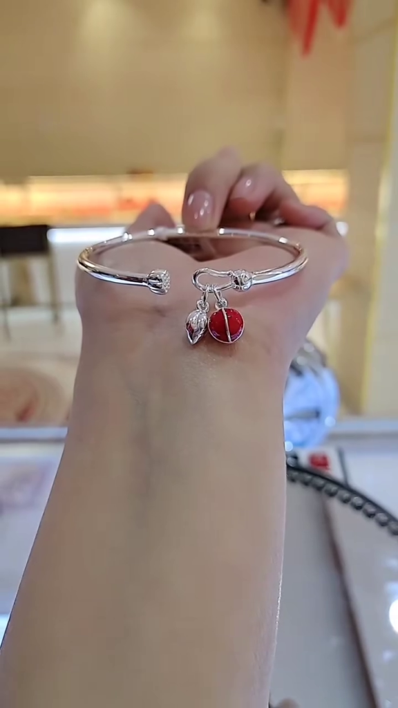 Charming Silver-Toned Bangle Bracelet with Enamel Ladybug and Leaf Charms - Photo 1