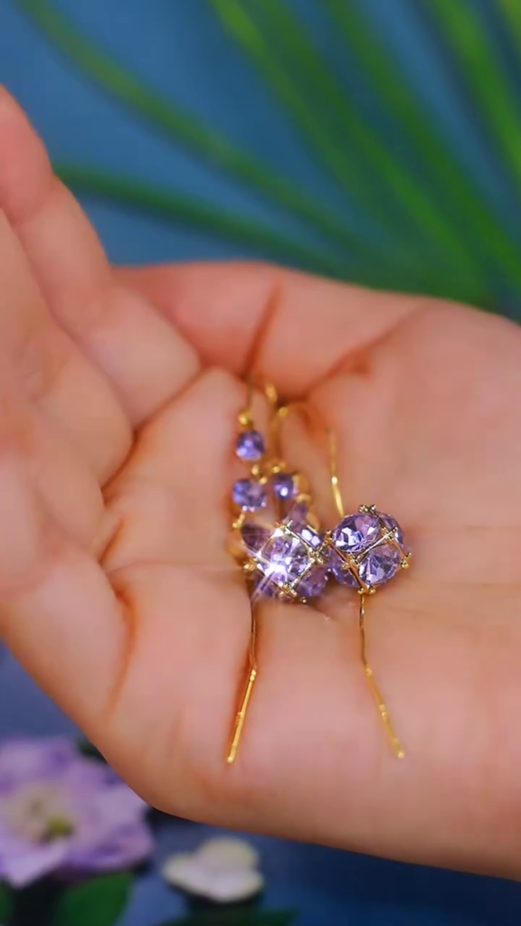 Elegant Gold-Toned Dangling Earrings with Purple Gemstone Clusters and Delicate Wirework - Photo 2