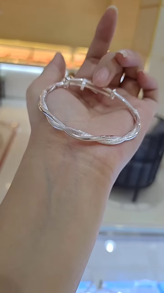 Elegant Twisted Sterling Silver Adjustable Bangle Bracelet - Photo 1