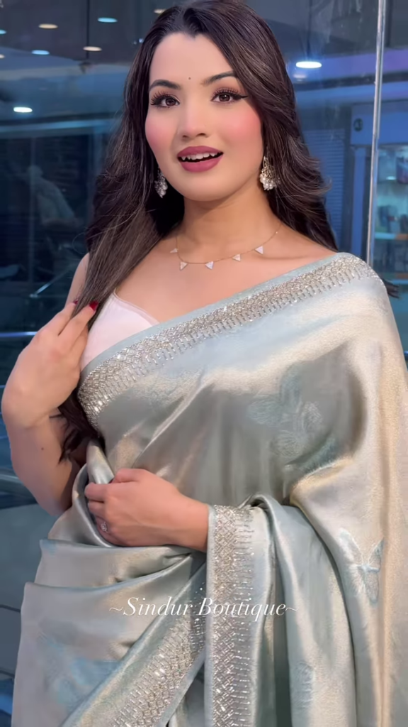 Elegant Sage Green Silk Saree with Sparkling Embellished Border - Photo 1