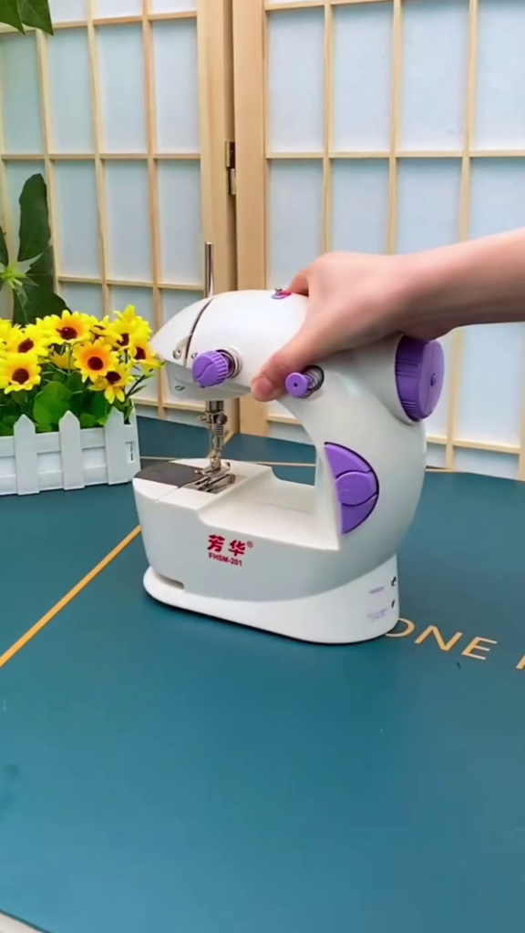 Portable Mini Sewing Machine with Foot Pedal - Compact and Lightweight - Photo 1
