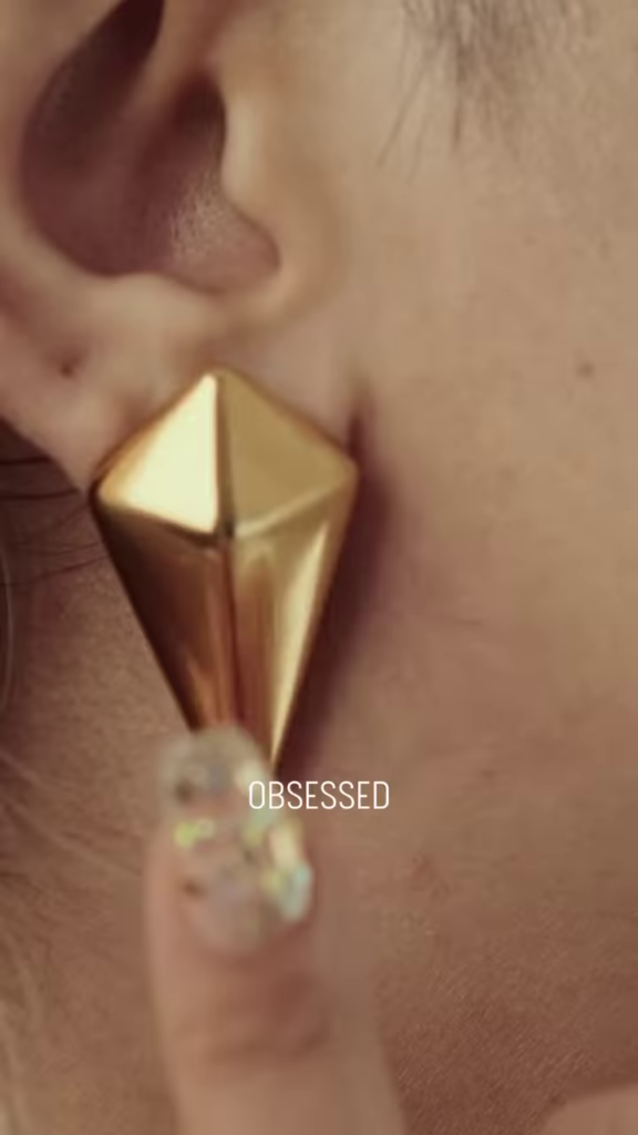 Close-Up of Stylish Gold-Toned Earrings: Teardrop, Stud, and Mesh Hoop - Photo 2