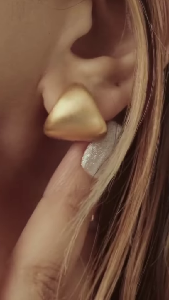 Close-Up of Stylish Gold-Toned Earrings: Teardrop, Stud, and Mesh Hoop - Photo 6