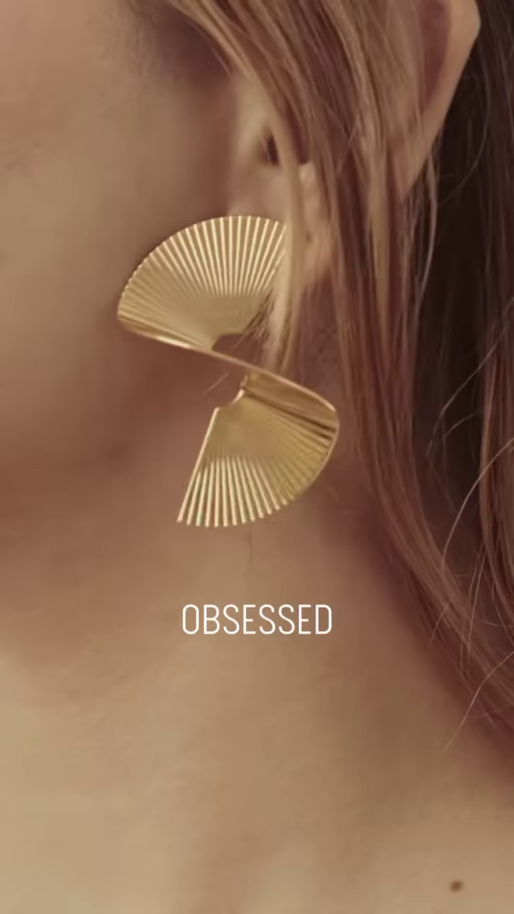 Close-Up of Stylish Gold-Toned Earrings: Teardrop, Stud, and Mesh Hoop - Photo 5