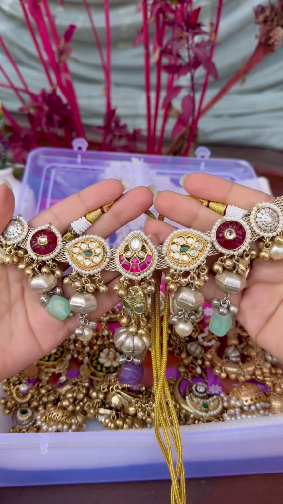 Exquisite Gold-Toned Jhumka Earrings with Kundan, Gemstones, and Pearl Details - Photo 3
