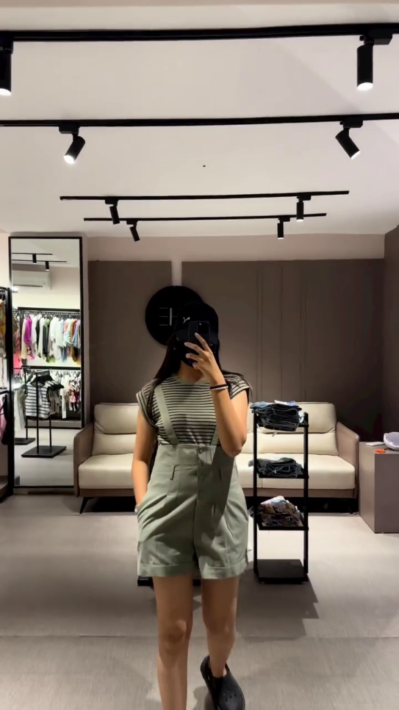 Casual Women's Olive Green Overall Shorts with Striped Tee - Photo 3