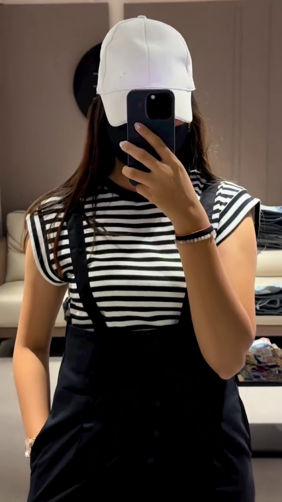 Casual Women's Olive Green Overall Shorts with Striped Tee - Photo 1