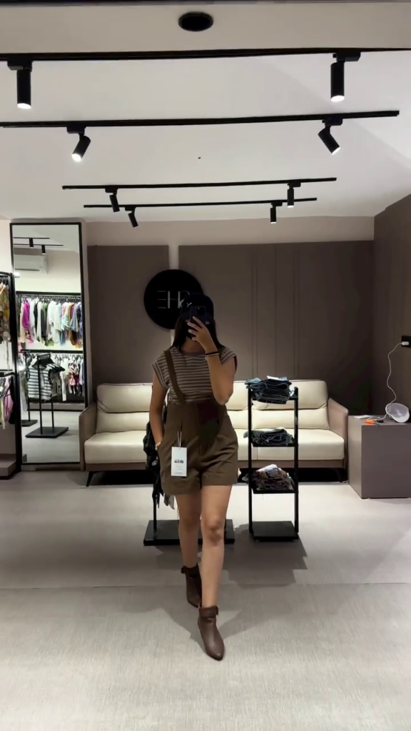 Casual Women's Olive Green Overall Shorts with Striped Tee - Photo 2