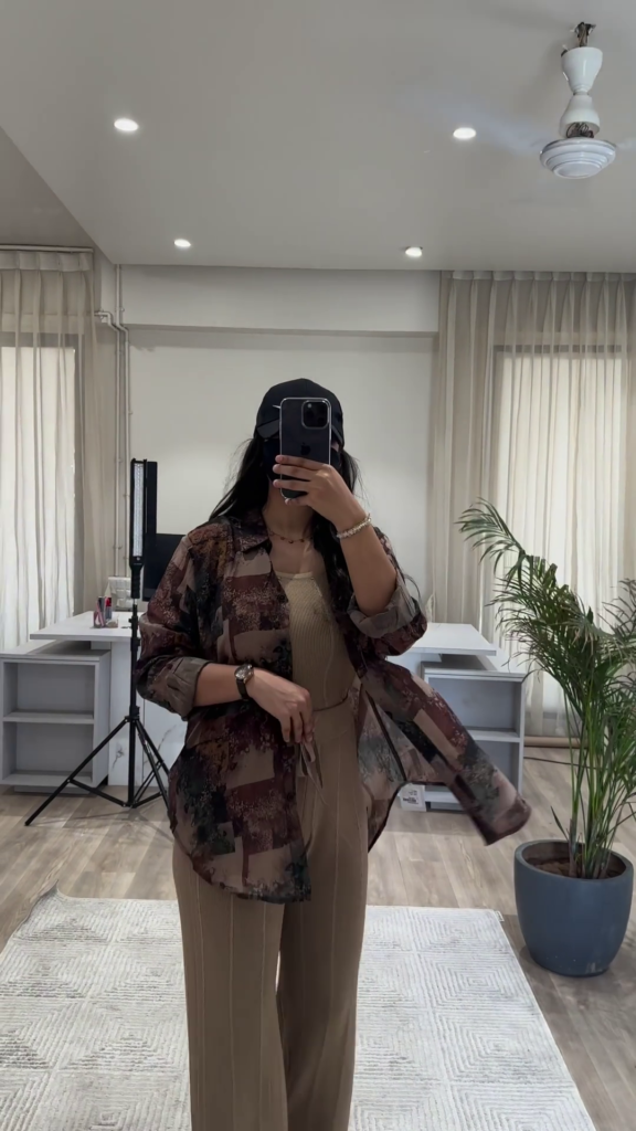 Bohemian Chic Outfit: Patterned Overshirt, Knit Top, and Wide-Leg Pants - Photo 2