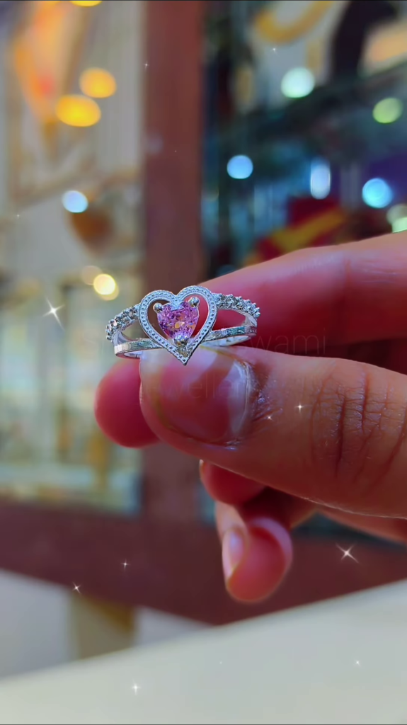 Elegant Heart-Cut Pink Gemstone Ring with Sparkling Accents - Photo 1