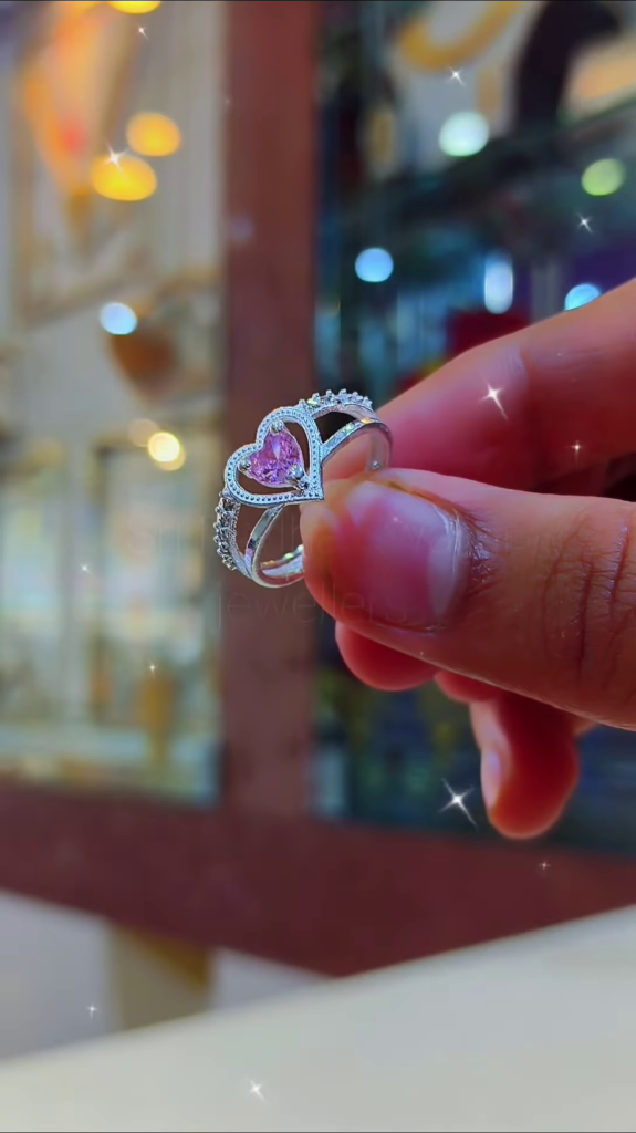Elegant Heart-Cut Pink Gemstone Ring with Sparkling Accents - Photo 2