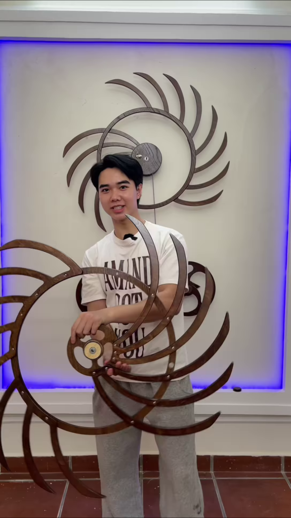 Intricate Kinetic Wall Sculpture with Moving Gears and Abstract Design - Photo 2