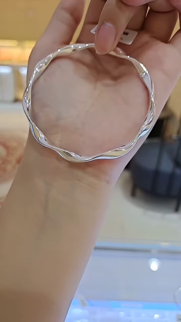 Modernist Twisted Silver Bangle Bracelet for Women - Photo 2