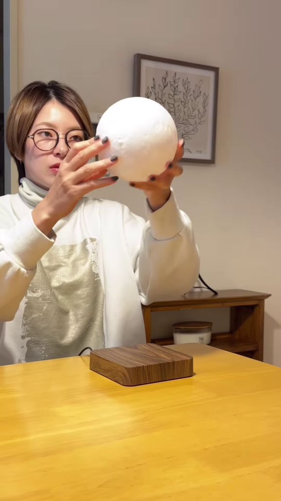 Levitating Moon Lamp with Touch Control and Realistic Lunar Detail - Photo 2