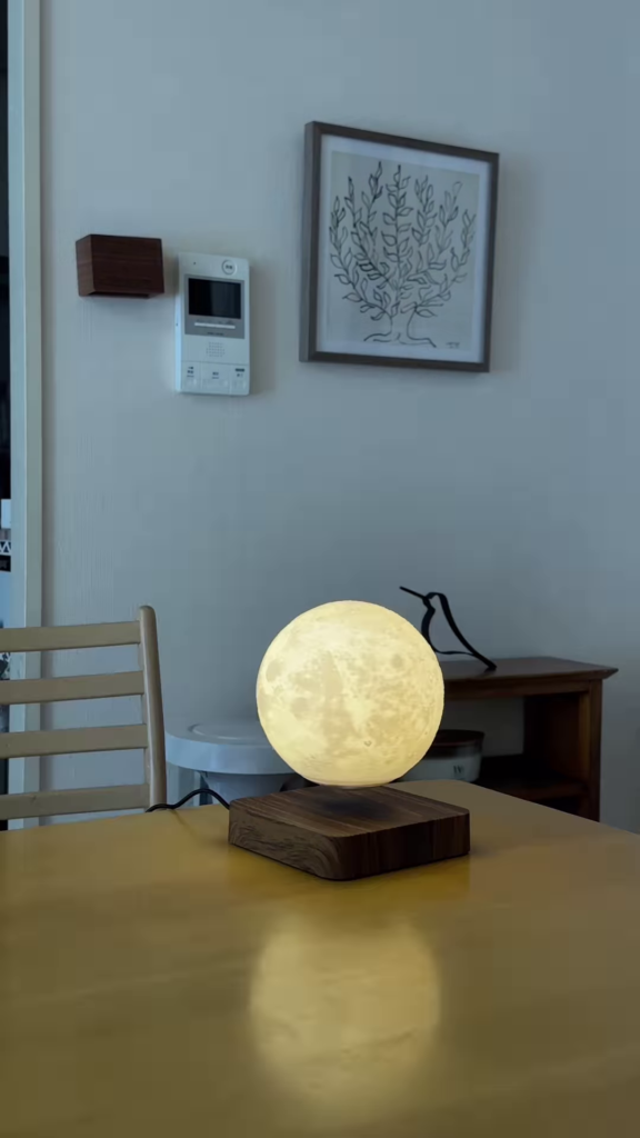 Levitating Moon Lamp with Touch Control and Realistic Lunar Detail - Photo 3