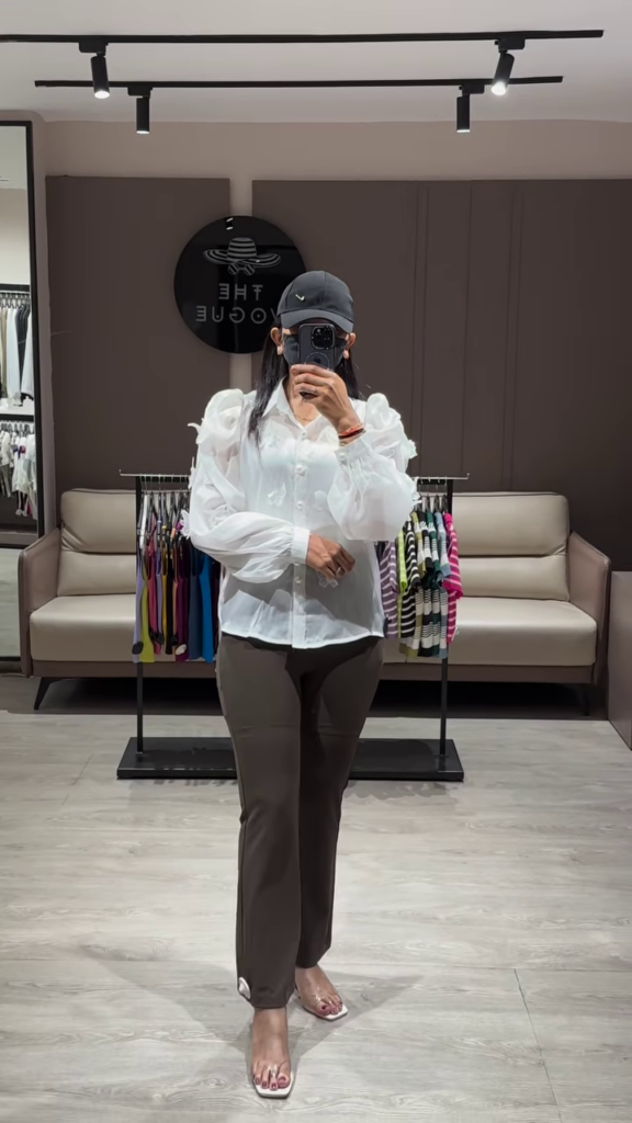 Elegant Sheer White Blouse with Ruffled Sleeves and Button-Down Front - Photo 1