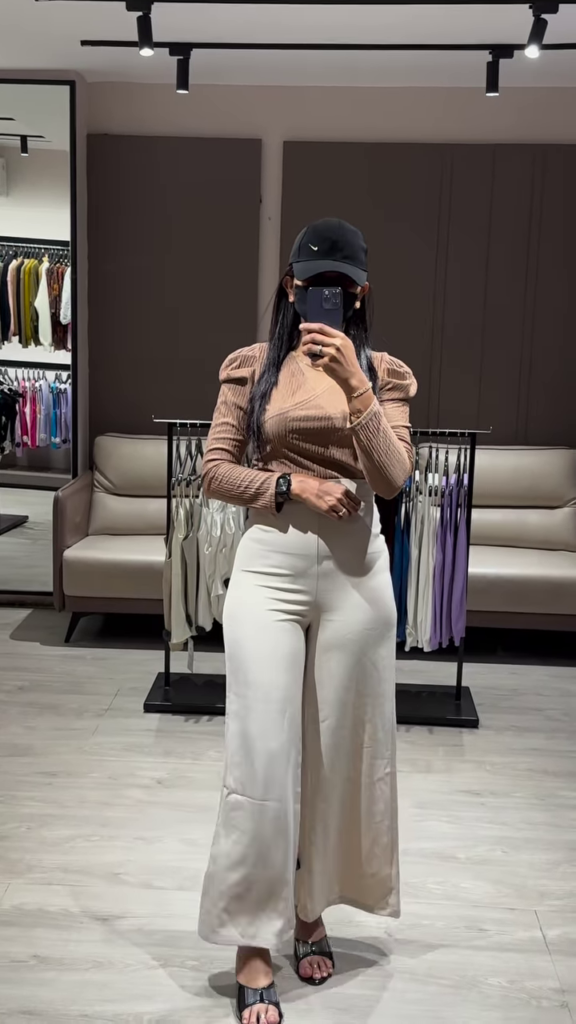 Elegant Ruched Sleeve Top with Deep V-Neck and High-Waisted Wide-Leg Pants - Photo 3
