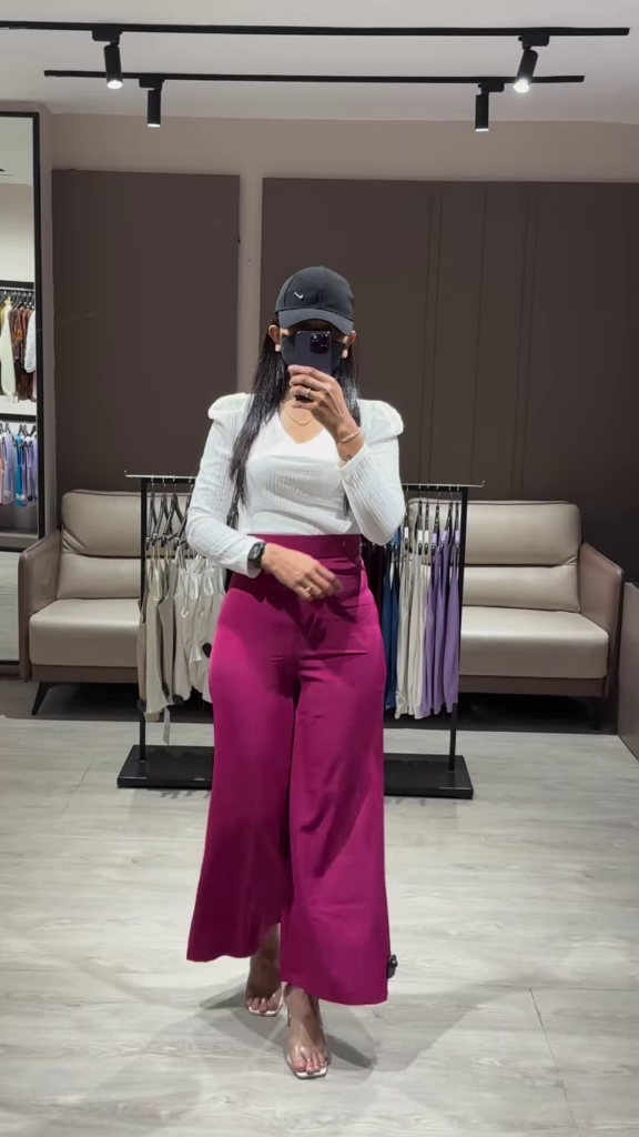 Elegant Ruched Sleeve Top with Deep V-Neck and High-Waisted Wide-Leg Pants - Photo 1