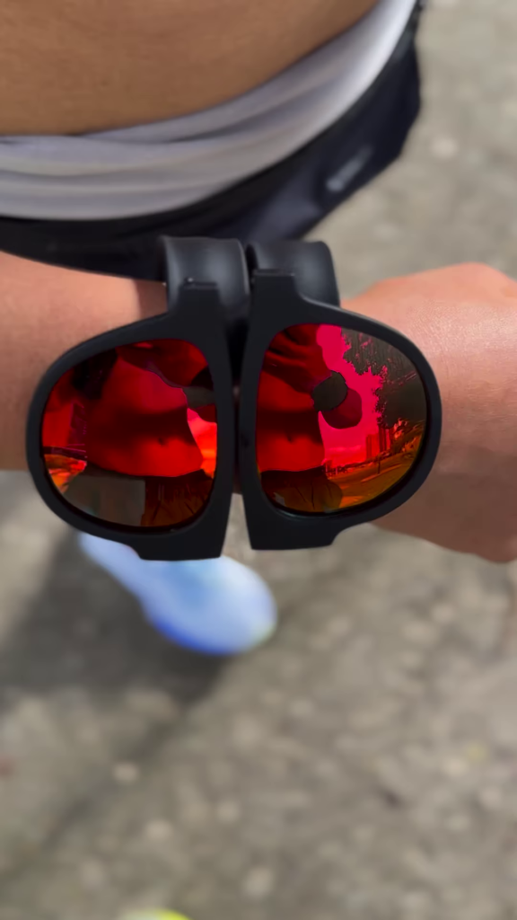 Foldable Sports Sunglasses with Mirrored Red Lenses and Secure Wrist Strap - Photo 1