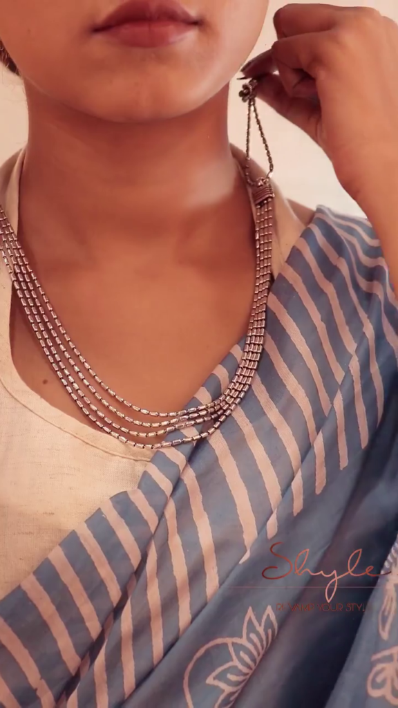 Elegant Silver-Toned Multi-Strand Necklace with Textured Finish - Photo 1