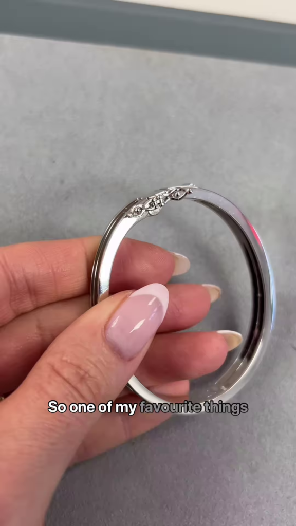 Elegant Silver-Toned Bangle Bracelet with Personalized Inscription and Sparkling Accents - Photo 2